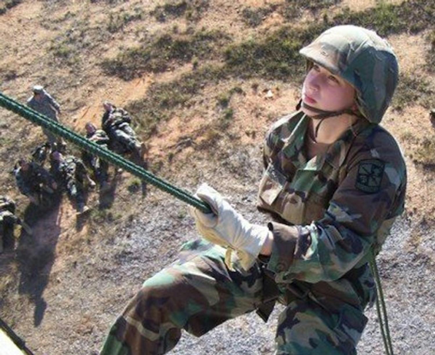 Sara Isaacson repels during a Tar Heel Battalion training exercise in 2007. Courtesy of Sara Isaacson.