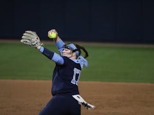 First-year pitcher Carlie Myrtle (17) pitches the ball versus Penn State on Friday, March 4, 2022. The Heels lost 0-12