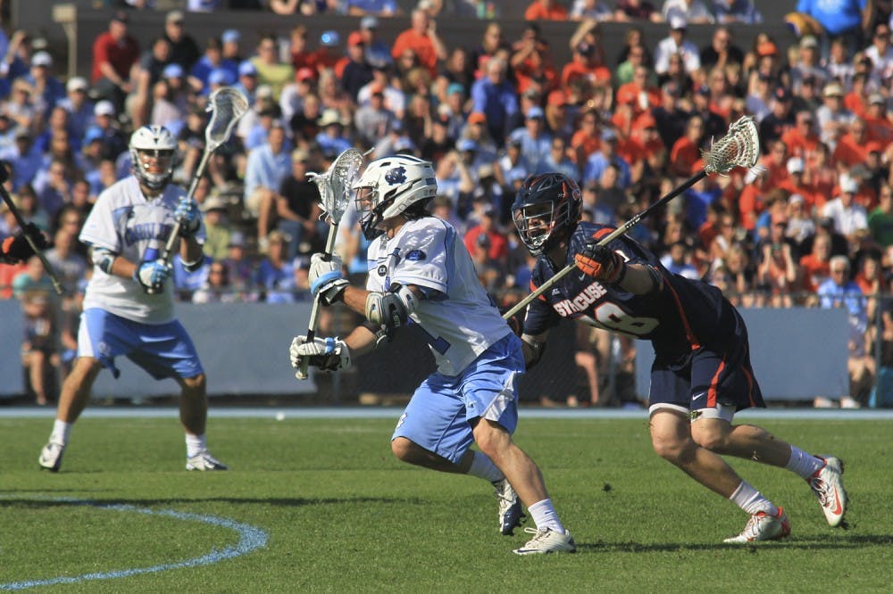 Senior Joey Sankey attempts a goal in the second half Saturday afternoon. Sankey became UNC's all-time leading scorer after UNC defeated Syracuse 17-15 at Fetzer field.