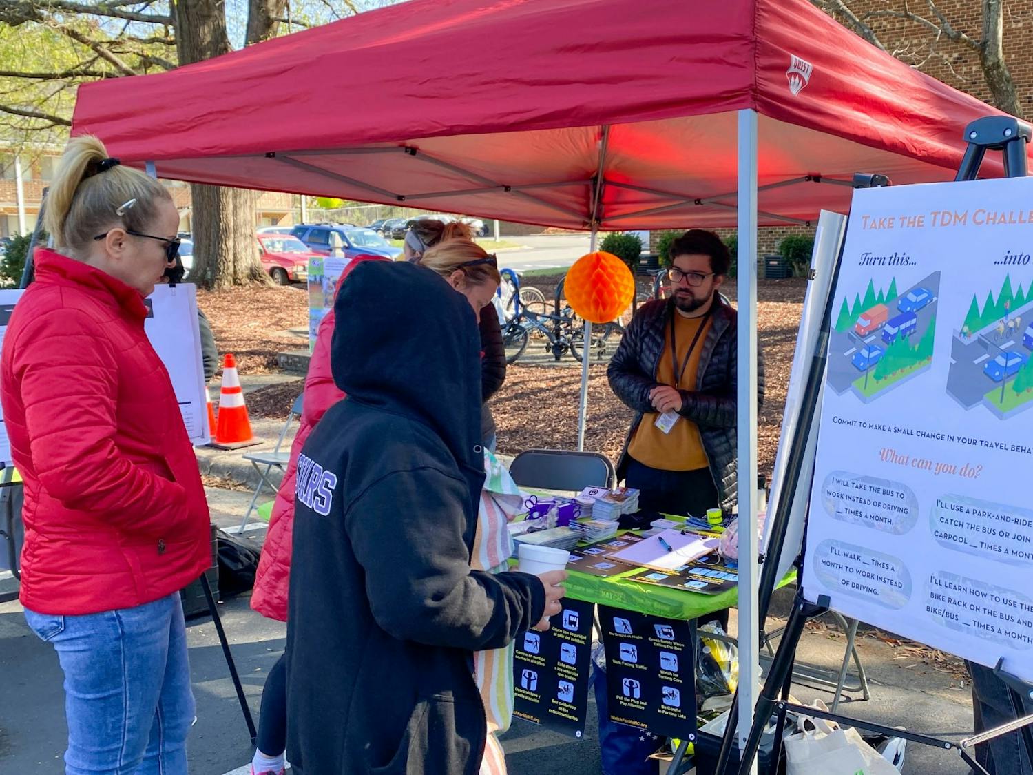 The Carrboro Planning Department informs community members of available public transit routes at the Carrboro in Motion event on Nov. 19, 2022. Community members participated in a variety of events at the neighborhood block party hosted at Estes Park Apartments.