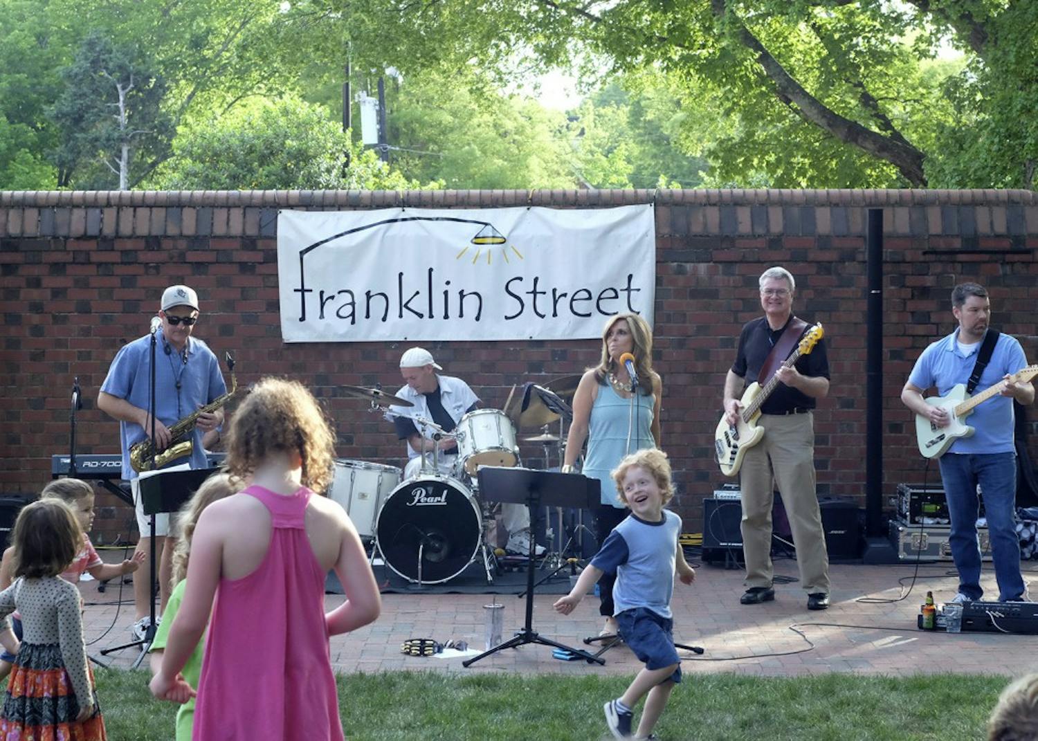 Mick Mixon &amp; The Franklin Street Band perform in front of the Carolina Inn as a part of the Fridays on the Front Porch concert series. 