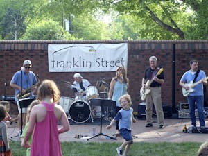 Mick Mixon &amp; The Franklin Street Band perform in front of the Carolina Inn as a part of the Fridays on the Front Porch concert series. 