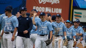 UNC baseball players form a handshake line after defeating Virginia on Thursday, May 25, 2023, 10-2.