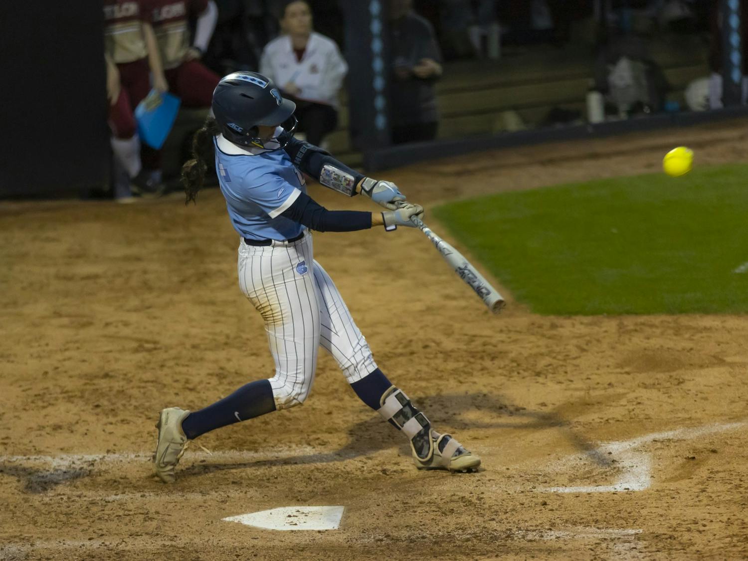 UNC fifth-year Kiersten Licea (1) hits the ball during the softball game against Elon at Anderson Stadium on Wednesday, Feb. 15, 2023. UNC beat Elon 9-5.