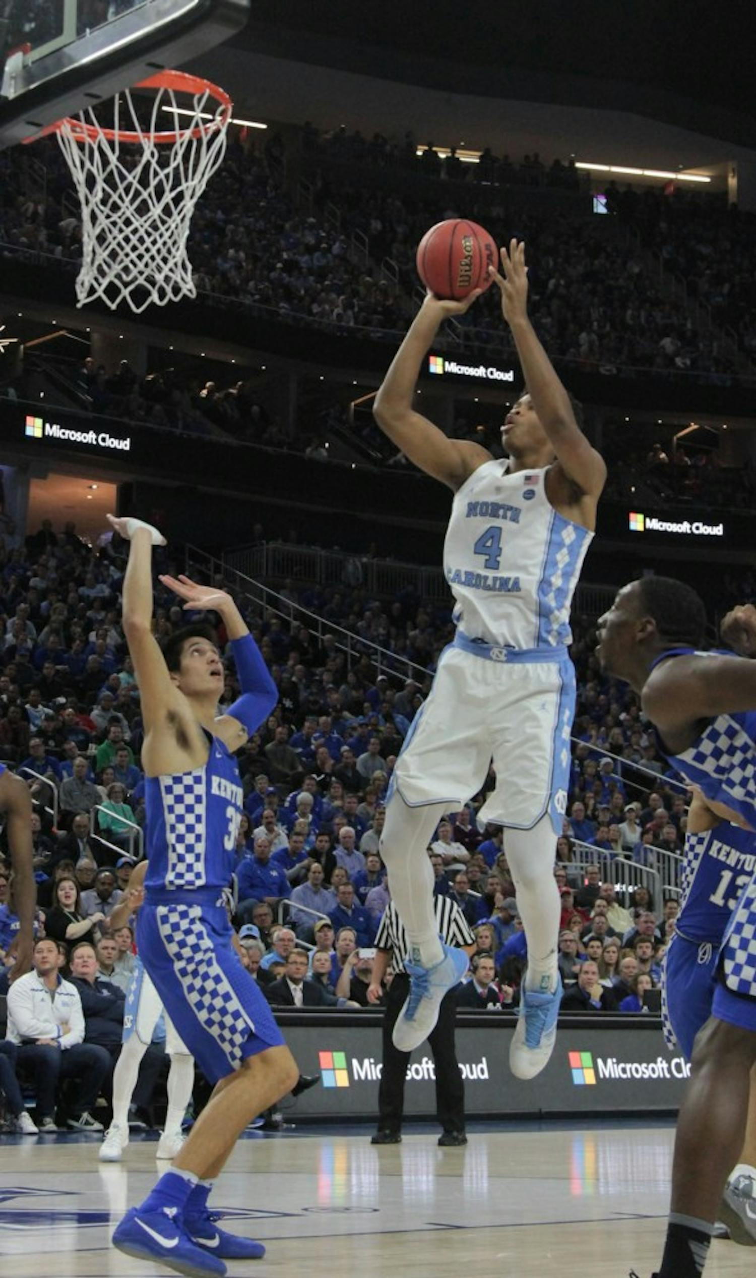 UNC forward Isaiah Hicks (4) goes for a contested shot against Kentucky at the CBS Sports Classic on Saturday.