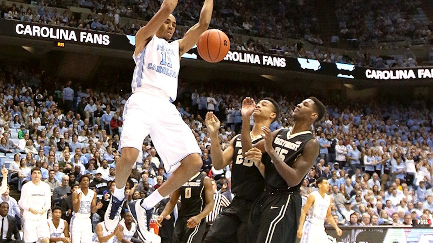 Brice Johnson (11) dunks the ball during North Carolina’s home game against Wake Forest.