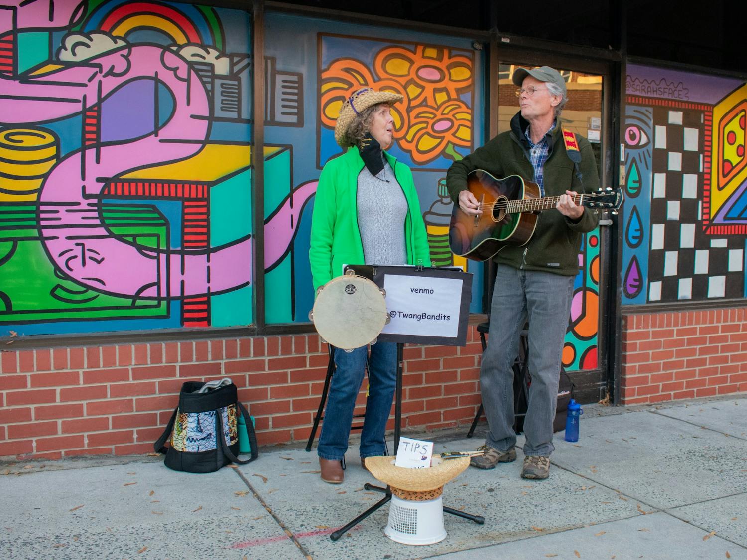 Catherine and Tony of the Twang Bandits play some classic country music on Franklin Street on Saturday, Oct. 17, 2020 for the Save The Music Series.