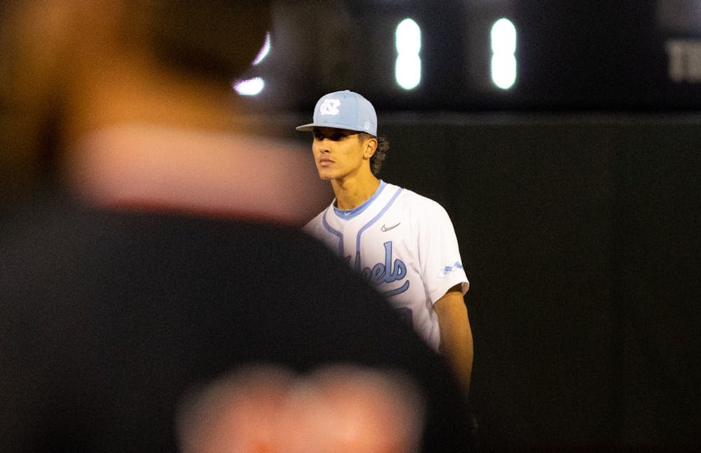 Sophomore second baseman Johnny Castagnozzi (19) sets up for the pitch during UNC's game against Campbell at Boshamer Stadium on Tuesday, April 19, 2022.