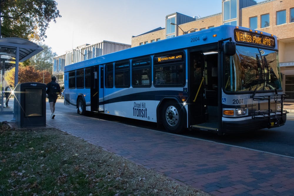 A bus picks up students and community members on South Road on Monday, Nov. 29, 2021. Chapel Hill has been facing an ongoing local bus shortage. 
