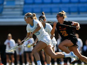 UNC junior midfielder Scottie Rose Growney (15) runs after the ball during the game against Maryland at Dorrance Field on Saturday, Feb. 22, 2020. No 1. UNC won against No 4. Maryland 19-6.