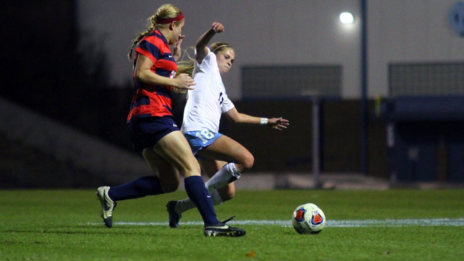 Megan Buckingham (19) chases down the ball Friday night in the first round of the NCAA tournament. The Tar Heels defeated Liberty 3-0. 