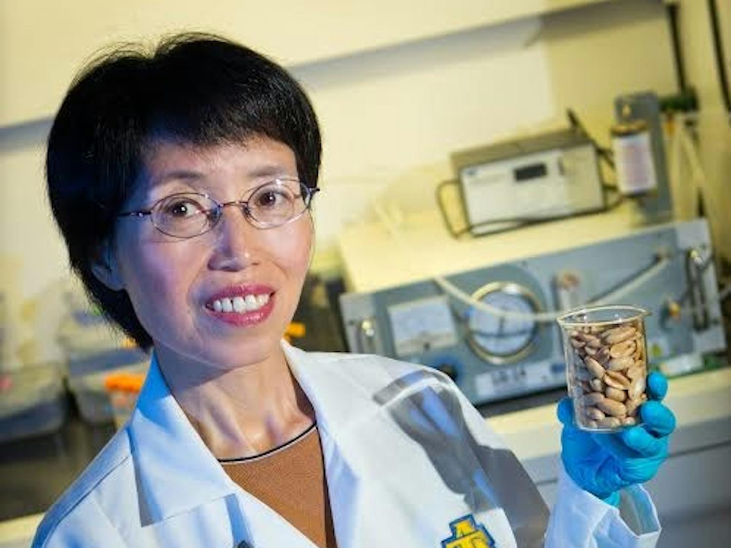 Dr. Jianmei Yu, a food science researcher in the College of Agriculture and Environmental Sciences at N.C. A&T,  who has patented research into decreasing allergens in peanuts. The process retains the quality and functionality of whole, roasted peanuts, and can easily be integrated into existing food production processes.
