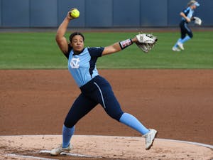 Senior Hannah George (42) pitches during the UNC women's softball game against North Carolina A&T at Anderson Softball Stadium on February 23, 2022.