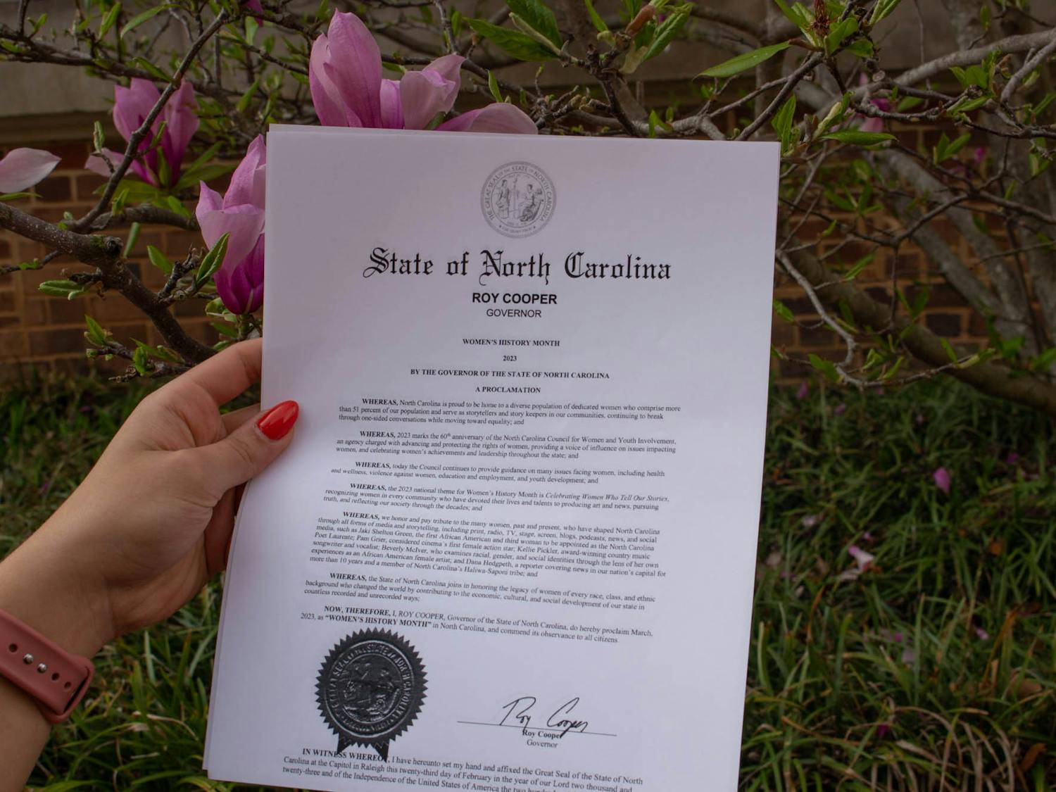 DTH Photo Illustration. The 2023 North Carolina Women's History Month Proclamation is displayed.