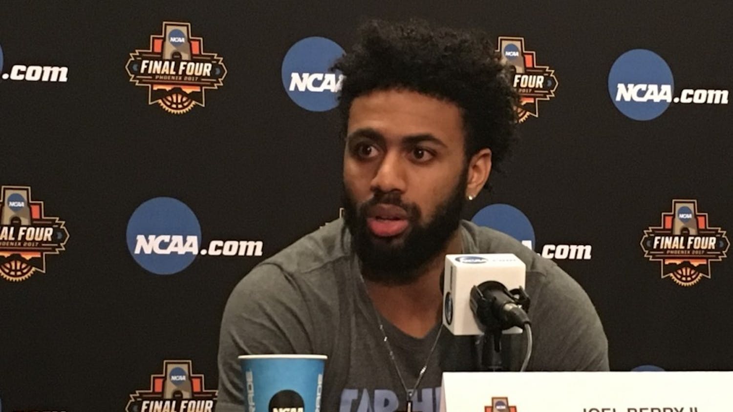 North Carolina guard Joel Berry speaks with the media inside University of Phoenix Stadium on Friday. Berry is expected to play in the Final Four against Oregon after injuring both his ankles earlier in the tournament.