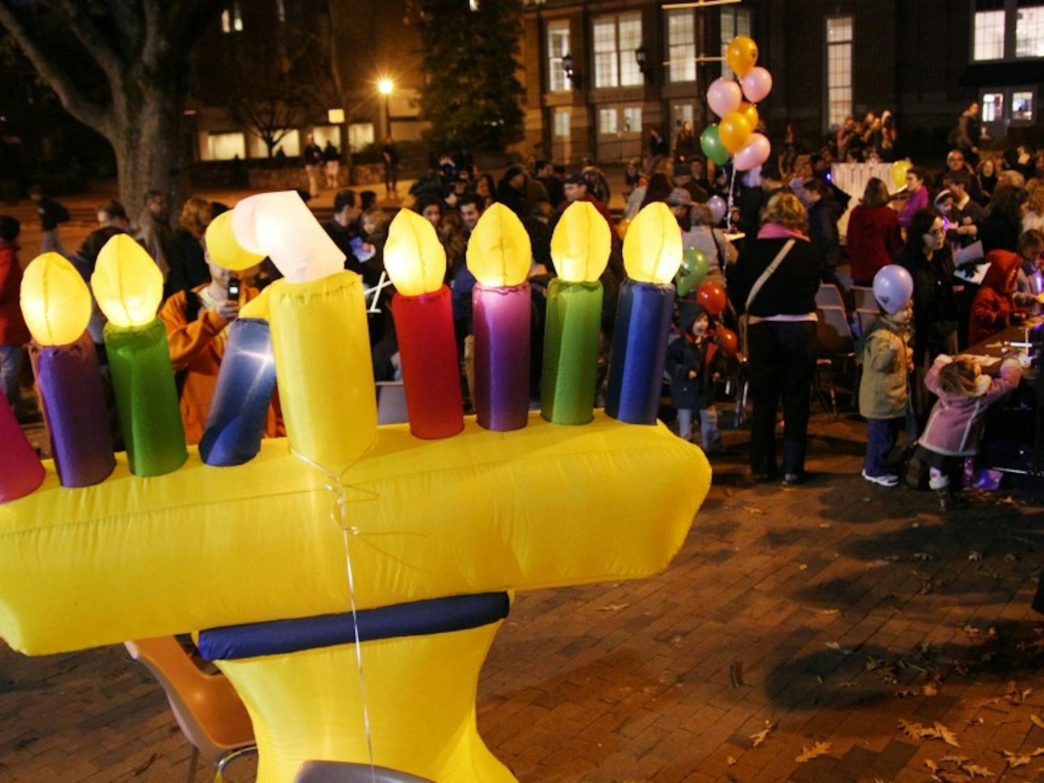 	A giant inflatable menorah decorates the Pit/ 