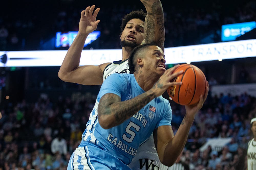 UNC senior center Armando Bacot (5) attacks the basket during the men's basketball game against Wake Forest on Tuesday, Feb. 7, 2023, at Lawrence Joel Stadium. UNC fell to Wake Forest 92-85.