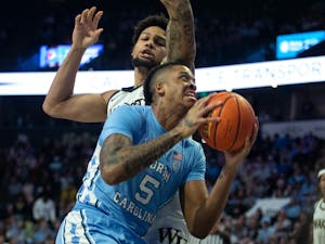 UNC senior center Armando Bacot (5) attacks the basket during the men's basketball game against Wake Forest on Tuesday, Feb. 7, 2023, at Lawrence Joel Stadium. UNC fell to Wake Forest 92-85.