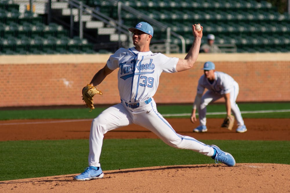 UNC pitcher and junior Brandon Schaeffer (39) throws a pitch during UNC's first in a three game series against Coastal Carolina on March 4, 2022, in Chapel Hill, NC. UNC picked up a victory 4-3.