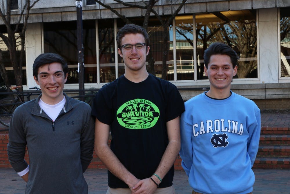 Zeke Parsons (Environmental Studies Major, middle), who started the Lettuce Club stands with two other members Brendan Gallagher (Mathematics Major, right) and Michael Bono (Business/Mathematical Decision Sciences Major, left). 