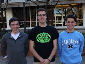 Zeke Parsons (Environmental Studies Major, middle), who started the Lettuce Club stands with two other members Brendan Gallagher (Mathematics Major, right) and Michael Bono (Business/Mathematical Decision Sciences Major, left). 