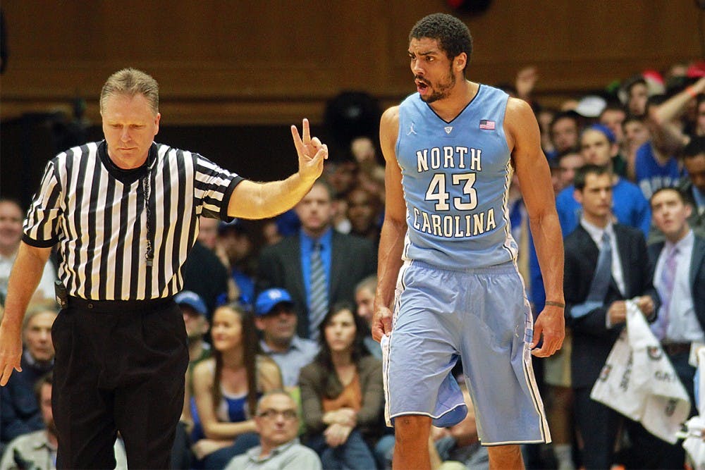 	James Michael McAdoo reacts to picking up a foul. McAdoo had foul trouble early in the game, and ended with four personal fouls.