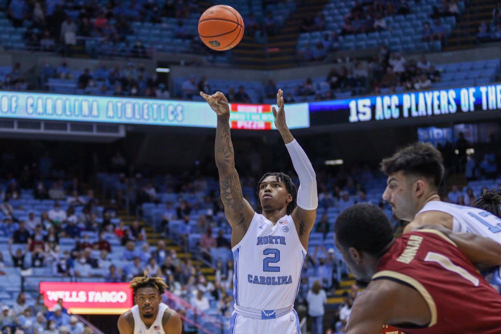 Sophomore guard Caleb Love (2) shoots a free throw at the game against Elon on Dec. 11 at the Dean Dome. UNC won 80-63.