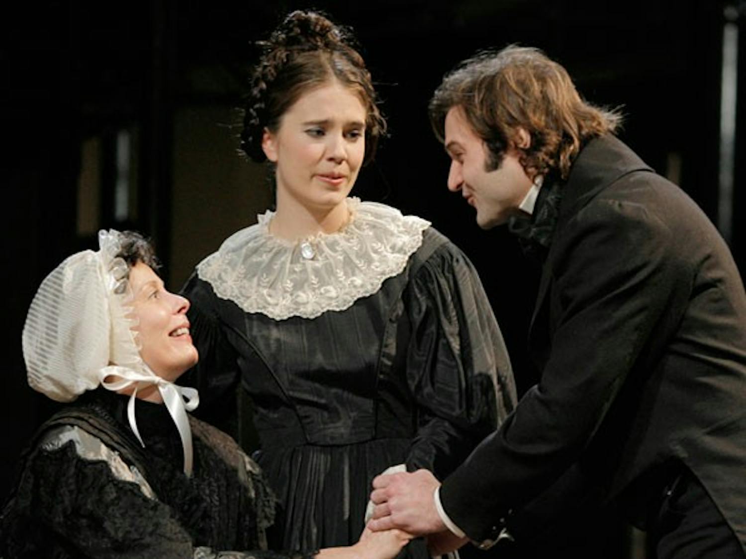 Julie Fishell, Marianne Miller and Justin Adams perform a scene from “Nicholas Nickleby.” Courtesy of Jon Gardiner