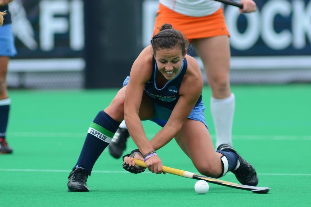 UNC Senior Caitlin Van Sickle (20) takes a shot on goal late in the game. 