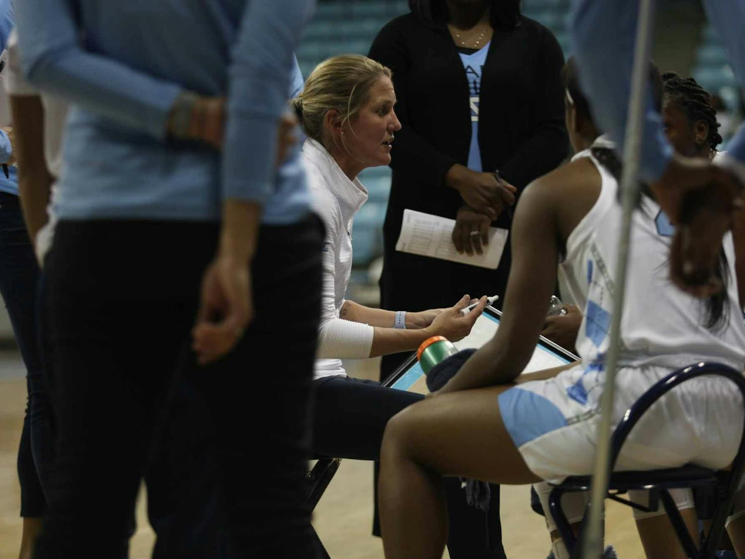 Head Coach Courtney Banghart talks to players during a time-out at exhibiton game against Wingate in the Charmichael Arena on Saturday, Nov. 2, 2019. UNC won 82-37.
