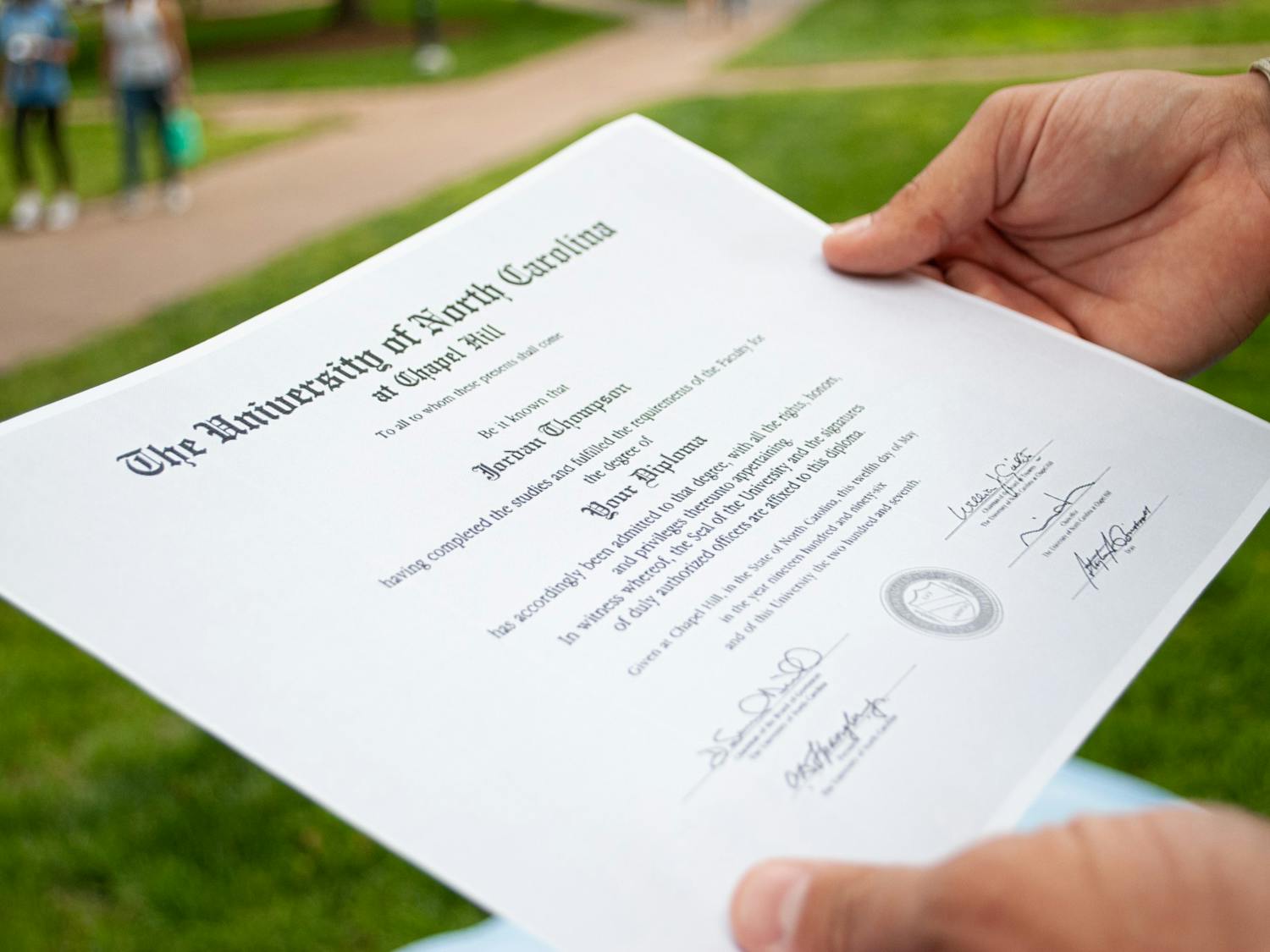 DTH Photo Illustration. The Registrar notified seniors that they will have the option to choose the name that appears on their diploma in ConnectCarolina.