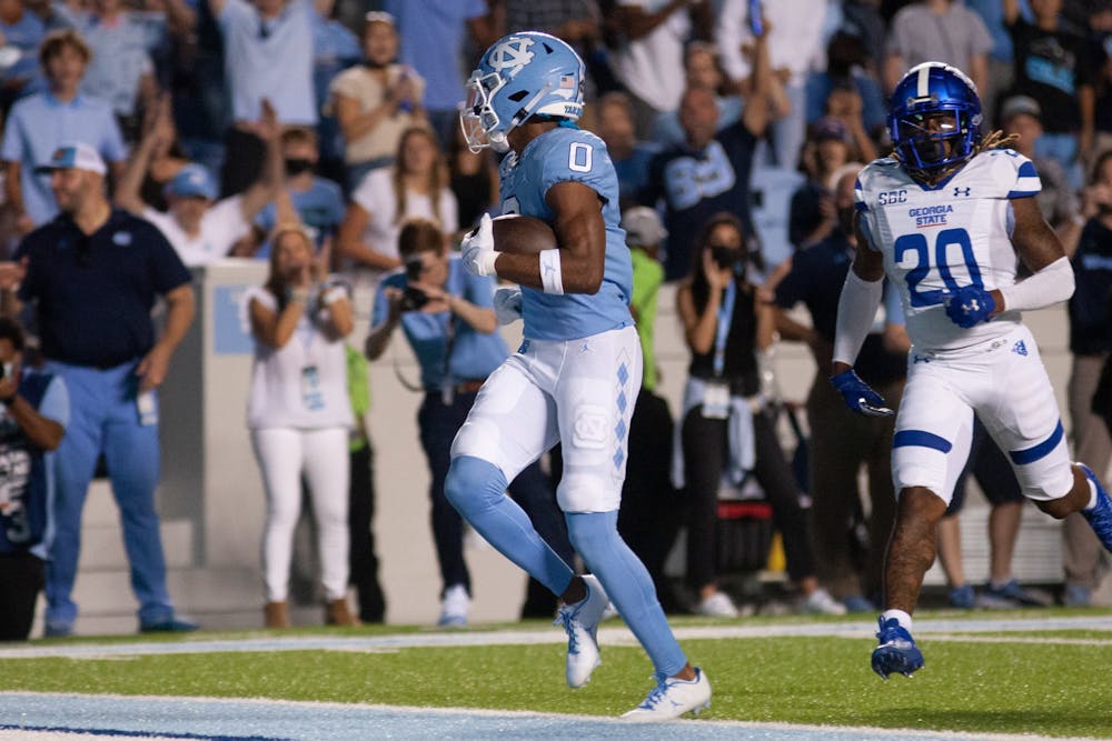 UNC junior wide receiver Emery Simmons (0) scores a touchdown at the game against Georgia State on Sept. 11 at Kenan Stadium. UNC won 59-17.