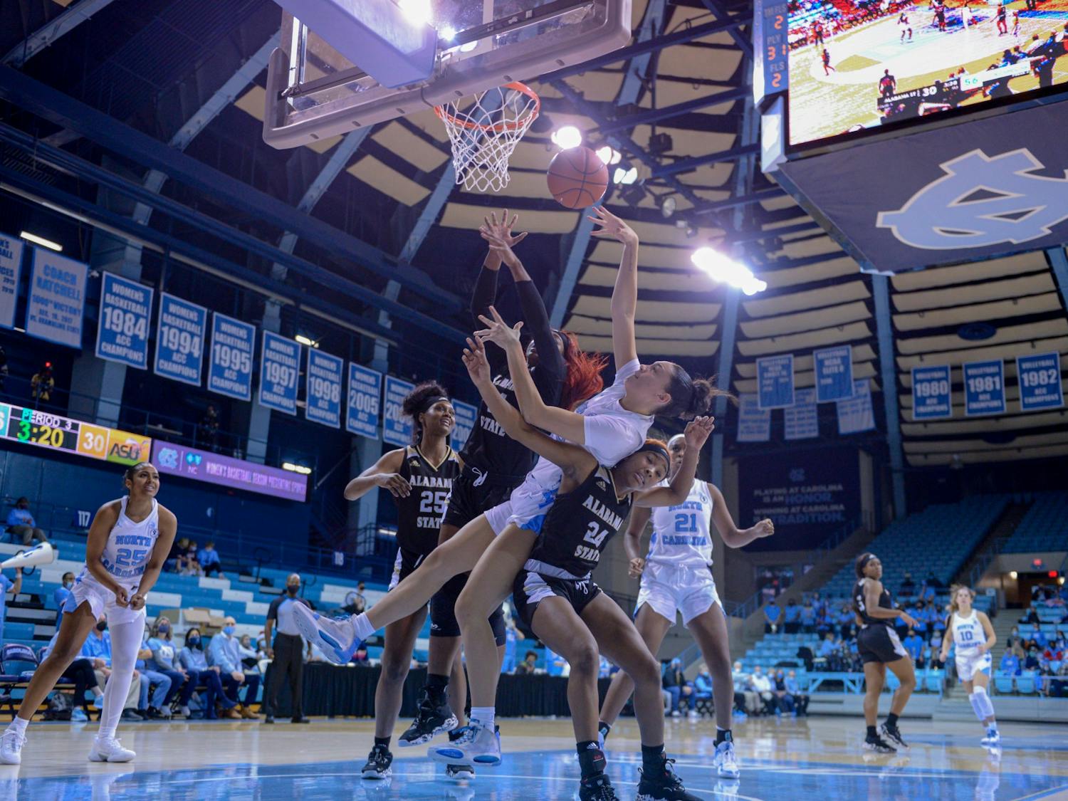 First-year guard/forward Destiny Adams (20) shoots the ball in the game against Alabama State in Carmichael Arena, on Dec 21, 2021.