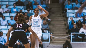 UNC junior guard Deja Kelly (25) motions to a teammate during the women's basketball game against Jackson State in Carmichael Arena on Wednesday, Nov. 9, 2022. UNC beat Jackson State 91-51.