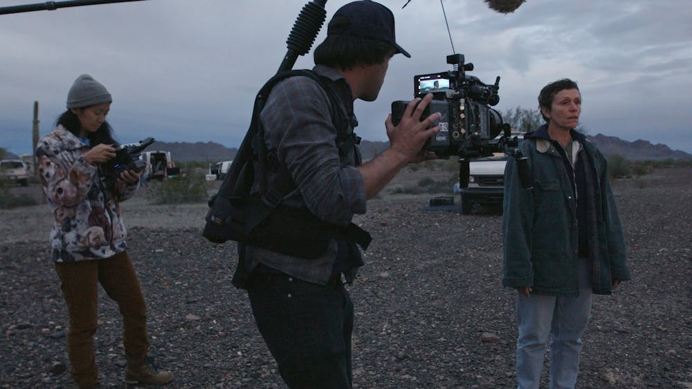 From left, Director and Writer Chloe Zhao, Director of Photography Joshua James Richards and Frances McDormand on the set of "Nomadland." Photo courtesy of Searchlight Pictures/2020 20th Century Studios/TNS