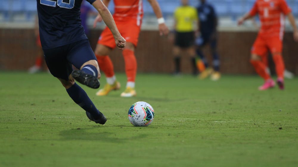 A UNC player prepares to kick a ball during a game against Clemson at Dorrance Field on Friday, Oct. 9, 2020. UNC won the game 1-0. 