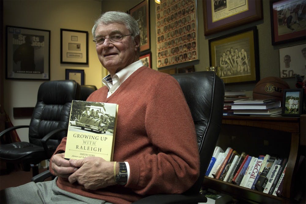 Former Raleigh Mayor and UNC alumnus Smedes York recently released a new biography entitled "Growing Up With Raleigh." The walls of his real estate company's conference room are adorned with personal photographs and sports memorabilia from his 50+ years in the public light.