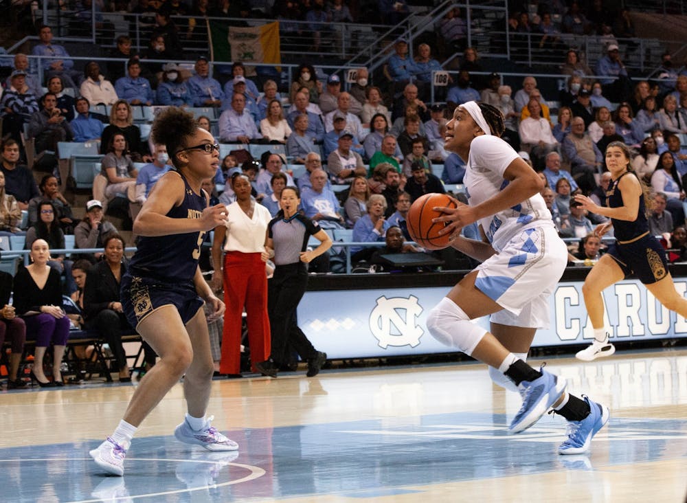 <p>UNC junior guard Kennedy Todd-Williams (3) drives toward the basket during the women's basketball game against Notre Dame in Carmichael Arena on Sunday, Jan. 8, 2023.</p>