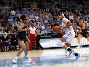 UNC junior guard Kennedy Todd-Williams (3) drives toward the basket during the women's basketball game against Notre Dame in Carmichael Arena on Sunday, Jan. 8, 2023.