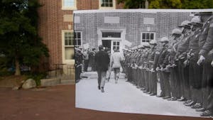 Lenoir Hall pictured on Sep. 14 juxtaposed with a photograph by Fil Hunter from the Food Workers’ Strike of 1969. In the spring of 1969, dining hall workers went on strike with the support of the Black Student Movement.