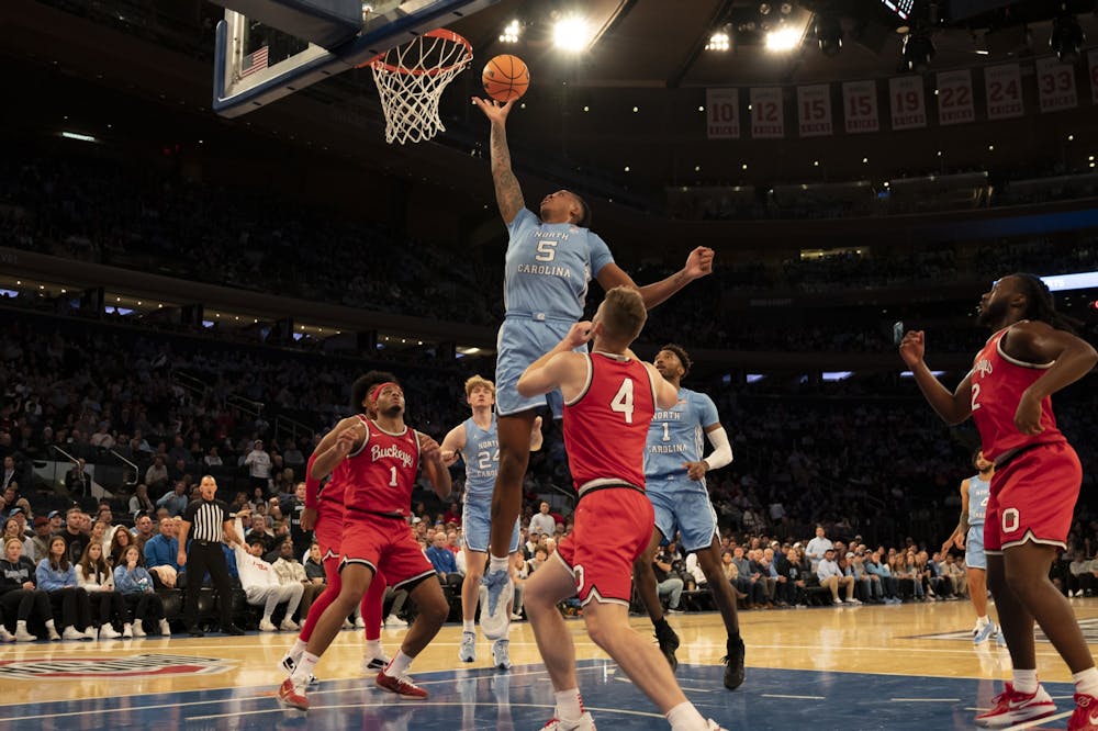 UNC senior Armando Bacot (5) takes a shot during the men's basketball game against Ohio State at Madison Square Garden on Saturday, Dec. 17, 2022. UNC beat Ohio State 89-84.