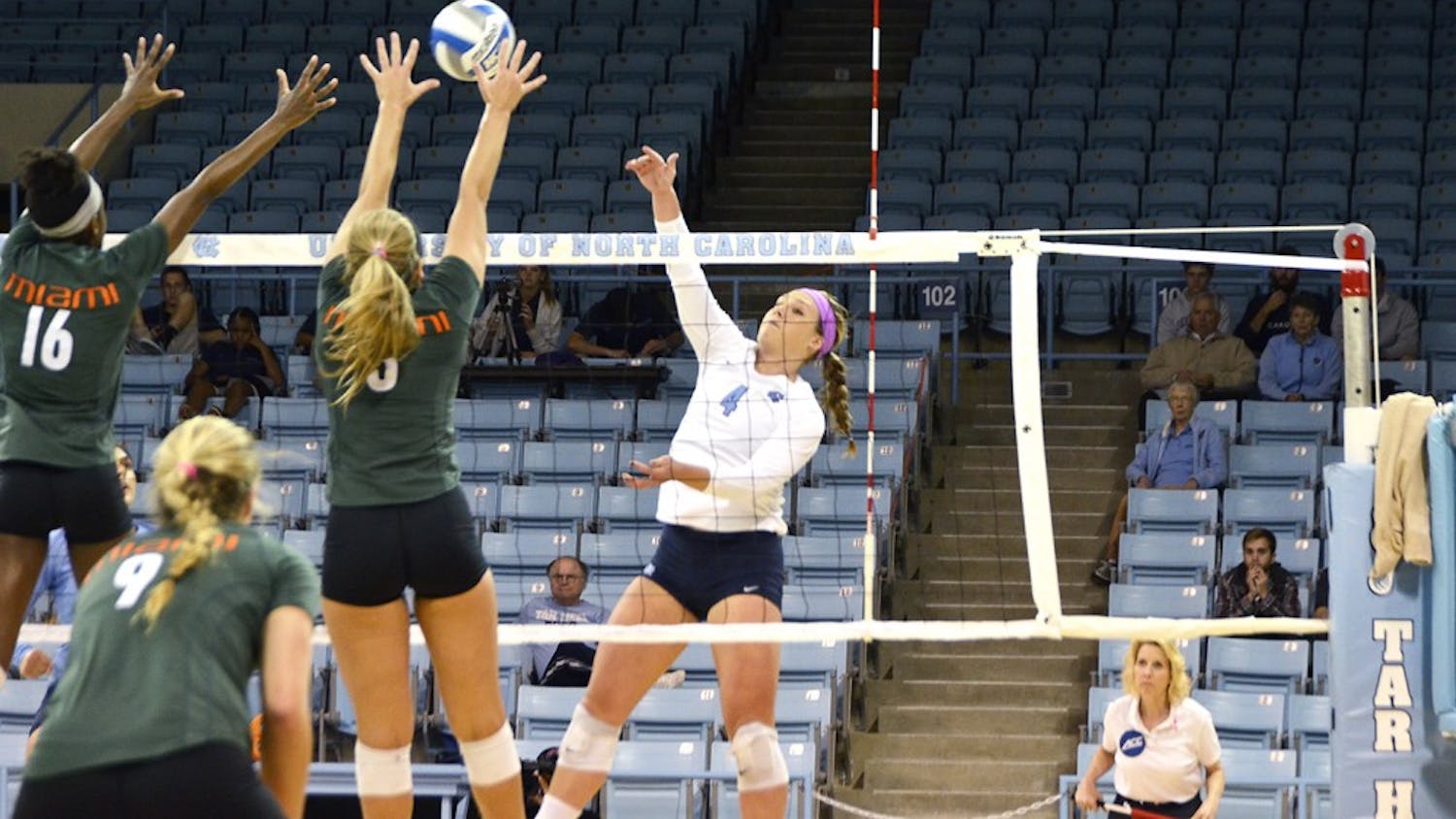 Leigh Andrew, a junior outside hitter, spikes a ball against Miami on Friday. UNC won 3-0 against the Miami Hurricanes.