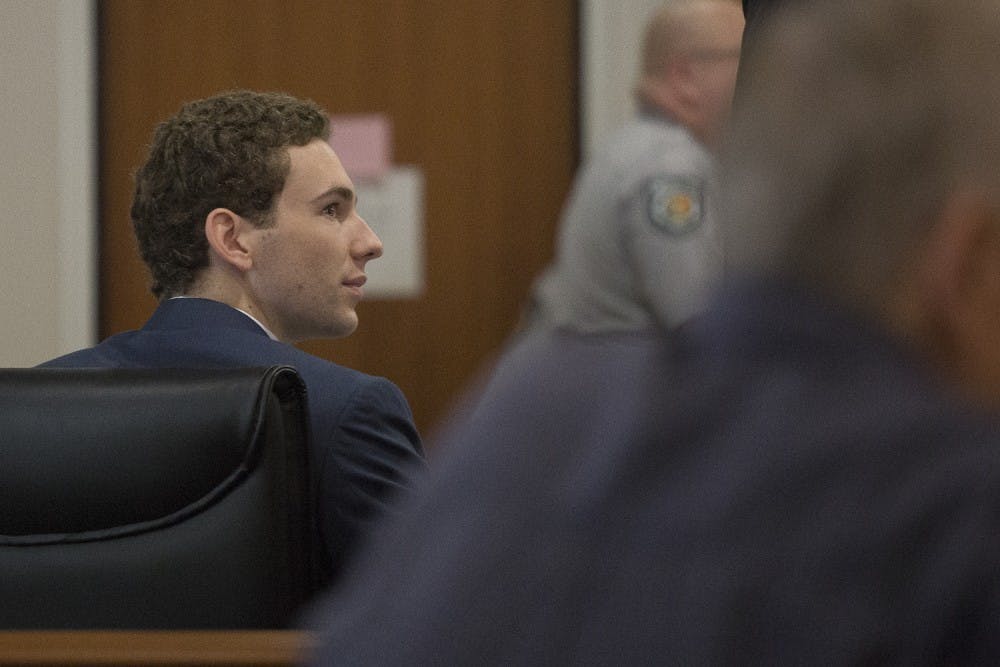 Former UNC student&nbsp;Chandler Kania sits at the front of the Battle Court Room in the Orange County Court House as the jury deliberates his case on Oct. 14, 2016.