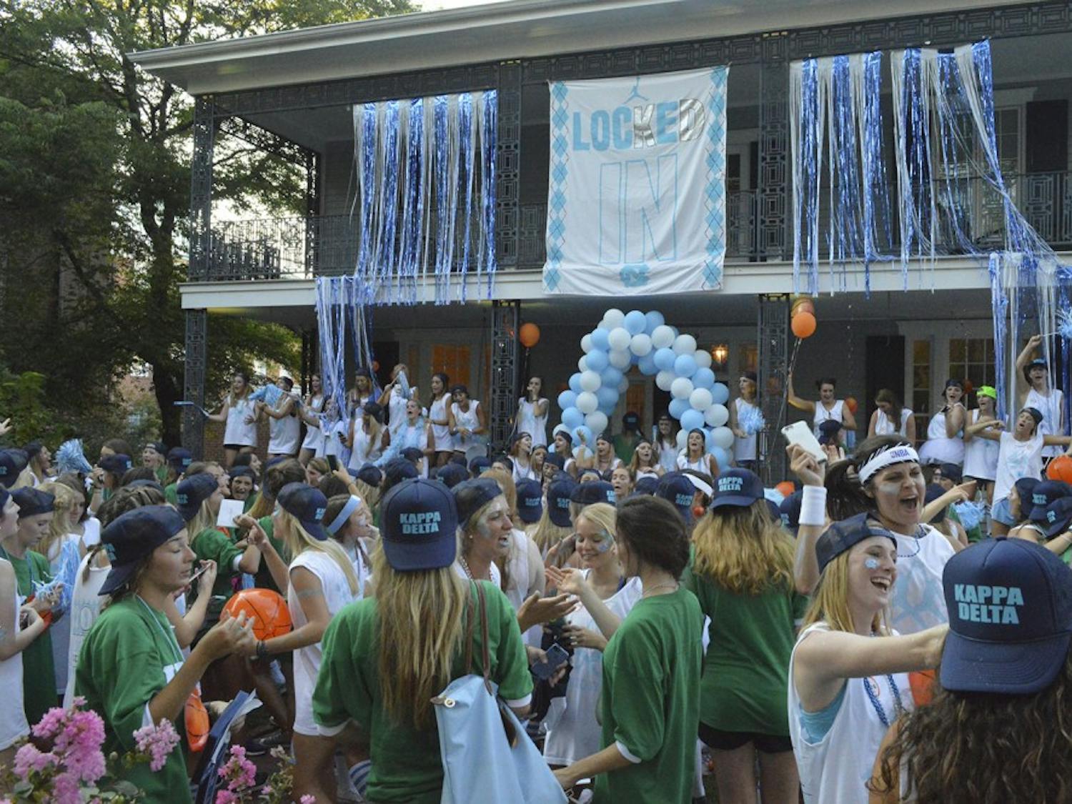 The KD house lights up as new members are welcomed in for the first time.