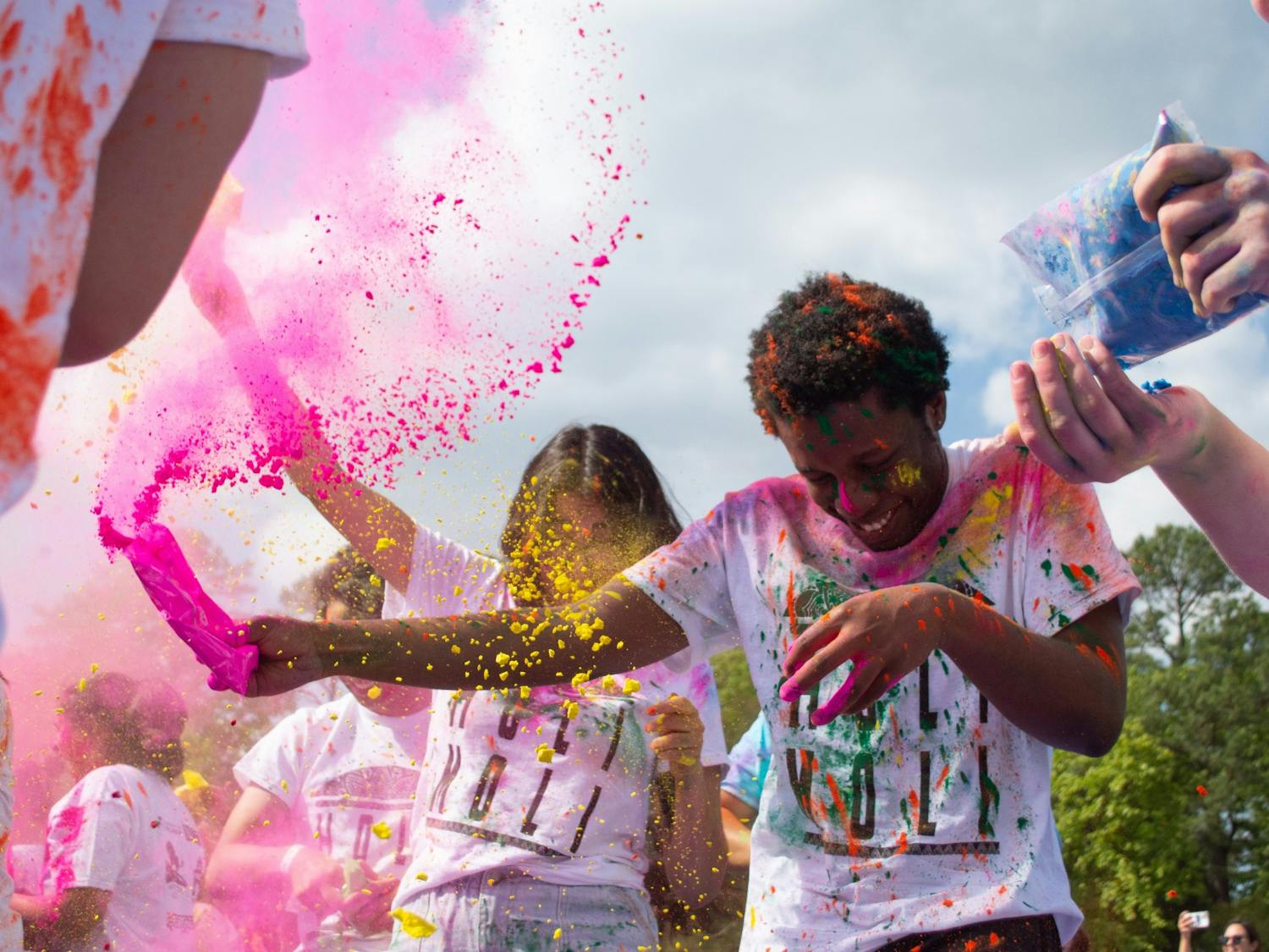 UNC students participate in &nbsp;Holi Moli, an annual event held by students to celebrate Holi, on Saturday, April 23, 2022.