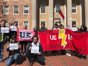 Members of UNC's chapter of UE local 150 stand with striking workers from other UE chapters in March 2019. UNC graduate student fees were recently restricted due to the efforts of UE150 and others. Photo Courtesy of UE150. 
