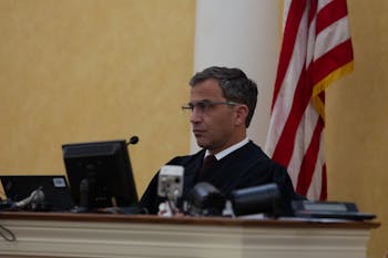 Judge Allen Baddour looks on as SCV lawyer Boyd Sturges speaks during the hearing on Wednesday. Feb. 12, 2020. Judge Baddour ruled to vacate the consent order and dismiss the lawsuit regarding Silent Sam.