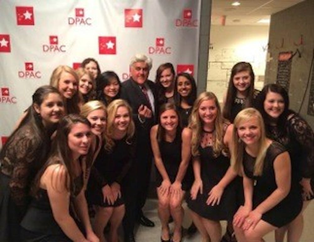 <p>The Loreleis pose with Jay Leno at the Durham Performing Arts Center</p>