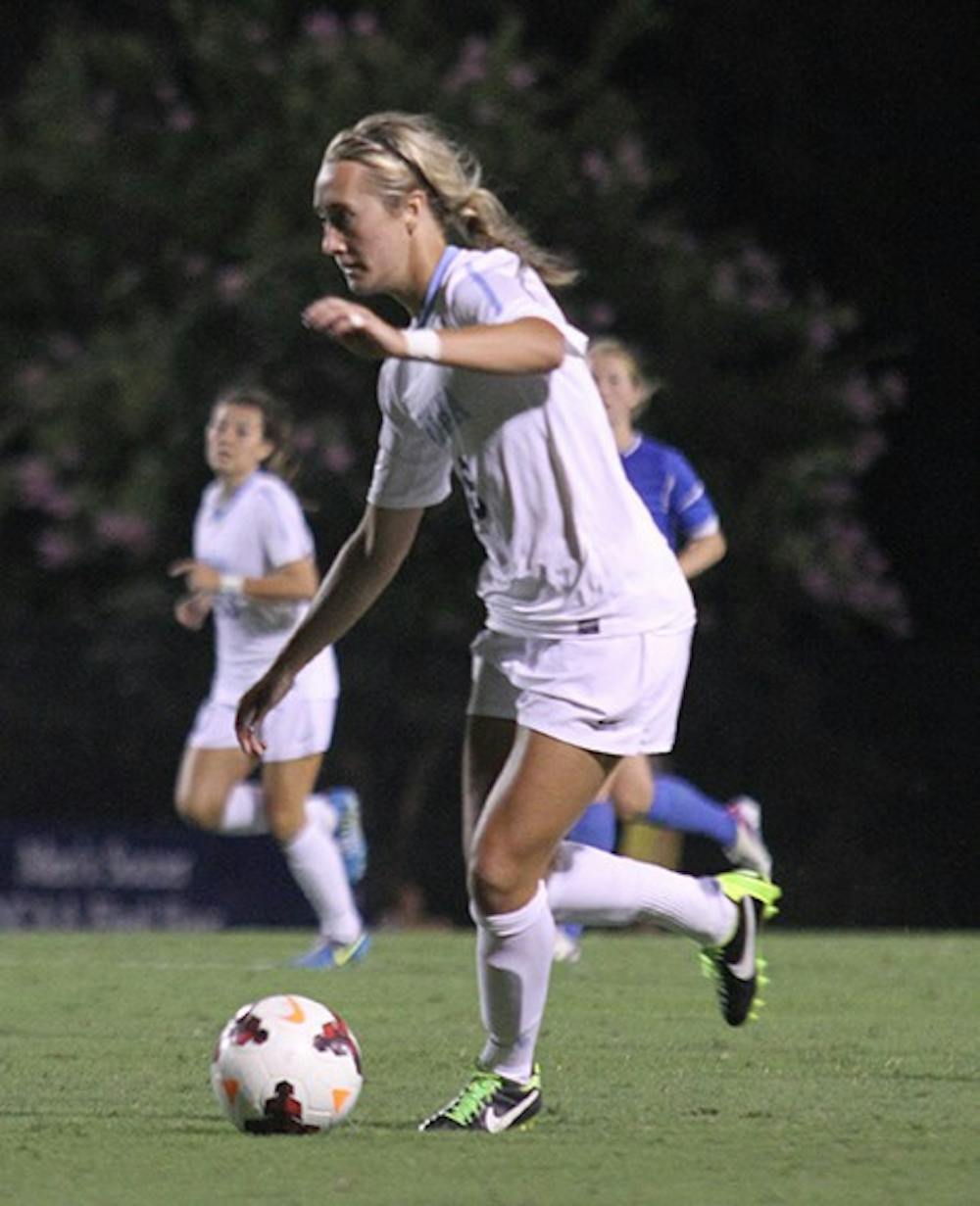 	Summer Green, 6, dribbles the ball in the match up between #1 UNC and #2 UCLA in Friday night&#8217;s game in Durham. 