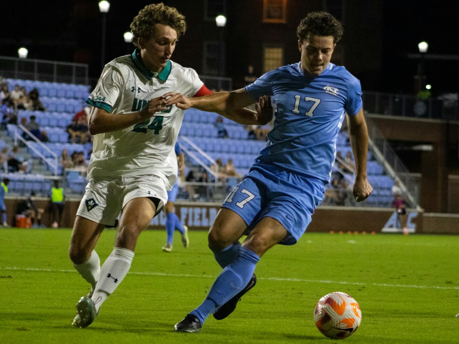 UNC senior midfielder Cameron Fisher (17) protects the ball during the Tar Heels' game against UNCW on Tuesday, Sept. 20, 2022, at Dorrance Field.